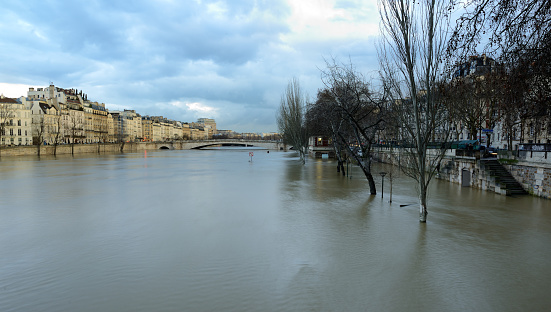 Paris on flooding alert, Seine river rising. 'Ile Saint-Louis' in background.