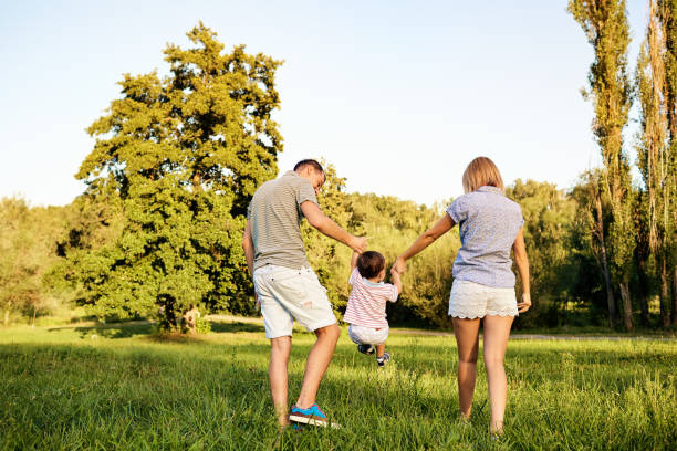 istock Happy family in nature 912125368