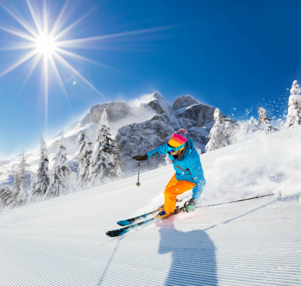 istock Young man skiing downhill in Alps 912125484
