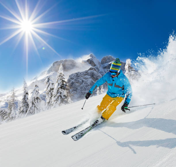 istock Young man skiing downhill in Alps 912126036