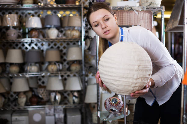 istock woman is buying lamp 912128726