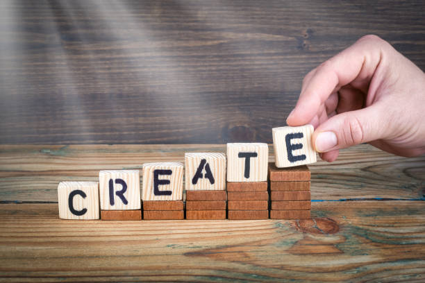 istock create. Wooden letters on the office desk, informative and communication background 912129684