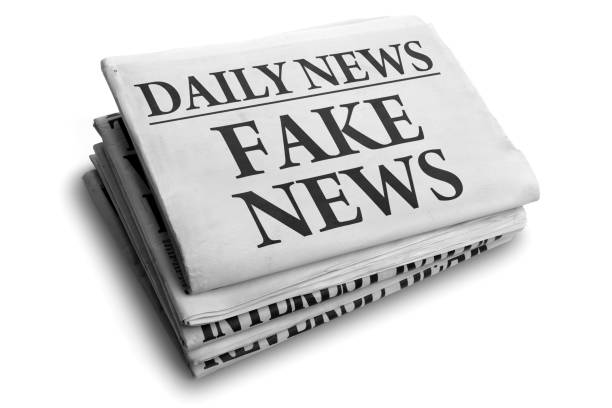 Fake news daily newspaper headline Daily news newspaper headline reading fake news concept for false event news headline front page stock pictures, royalty-free photos & images