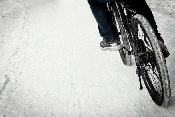 istock A Man Riding A Bike in Winter 912130252