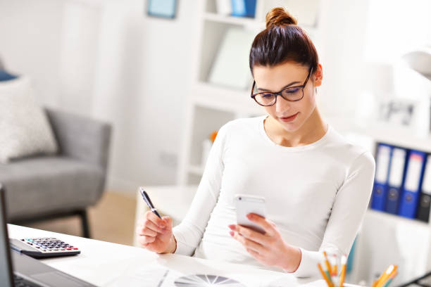 istock Woman working in her home office 912133496