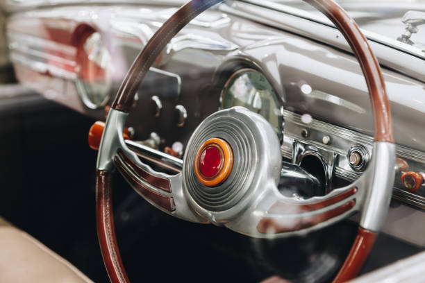 istock Interior vintage car with steering wheel and dashboard. 912134614