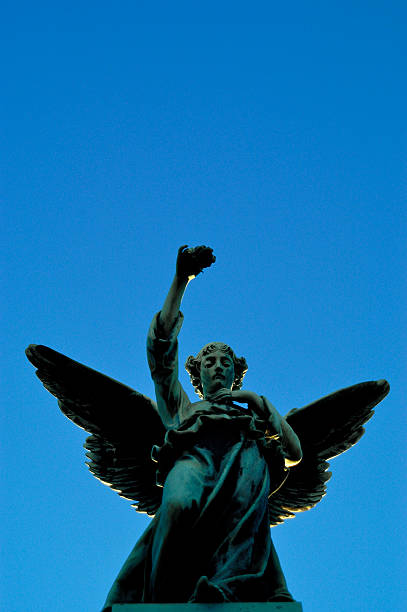 istock Winged Angel Looks Down From Blue Sky 91213528
