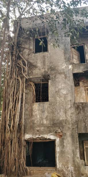 istock Old obsolete industrial building ruined 912139238