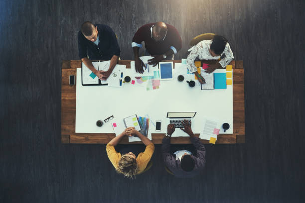 istock Taking their company to the top with teamwork 912141684