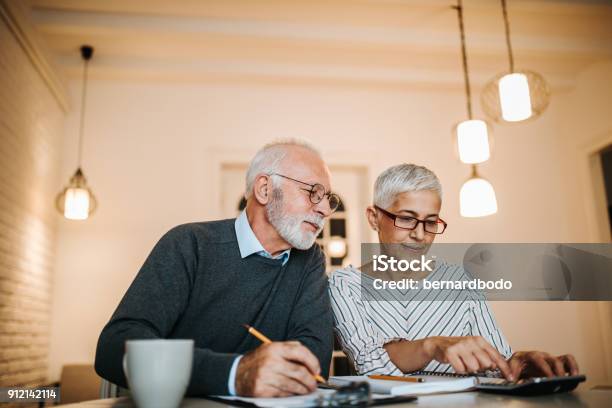Making A Financial Plan Stock Photo - Download Image Now - Retirement, Savings, Couple - Relationship