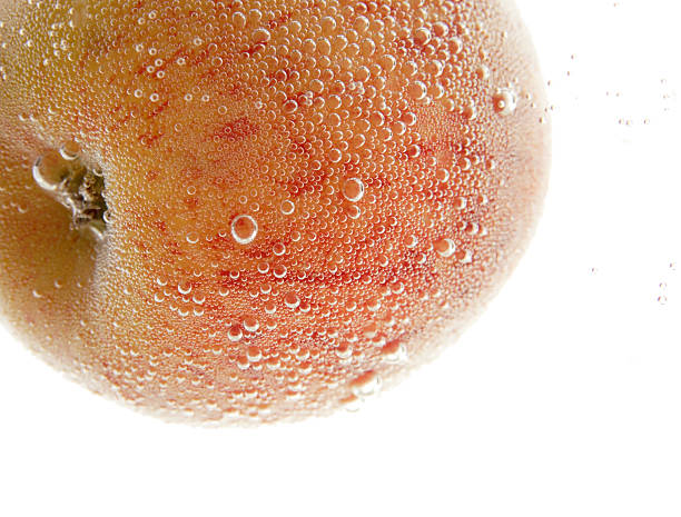 red apple in mineral water