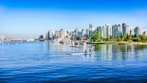 Vancouver skyline with harbor, British Columbia, Canada Vancouver skyline with harbor, British Columbia, Canada false creek stock pictures, royalty-free photos & images