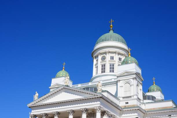 istock Helsinki cathedral view against blue sky 912147032