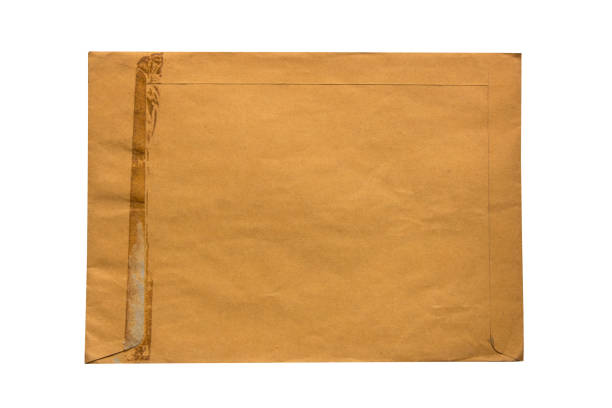 old brown envelope  isolate on white background - envelope brown yellow manila paper imagens e fotografias de stock