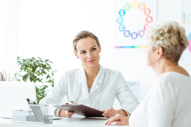istock Smiling dietician conducting medical history 912150840