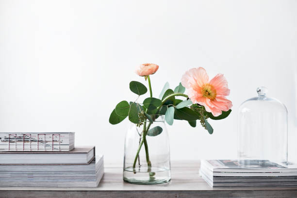 istock pastel cut flowers in a glass vase 912153106