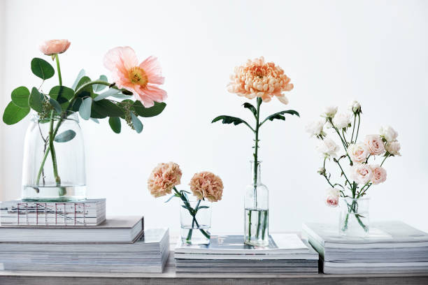 istock pastel cut flowers in a glass vase 912153120