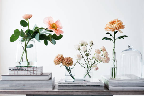 istock pastel cut flowers in a glass vase 912153124