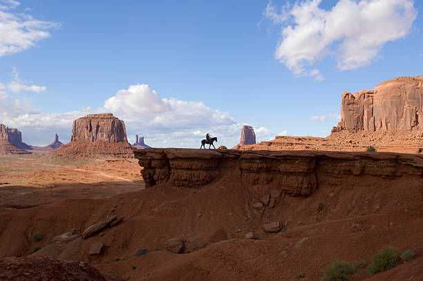 istock Monument Valley - Horseman in Silhouette 91215753