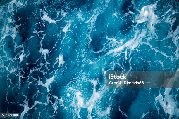 Fondo De Agua Espuma De Mar Azul Foto de stock y más banco de imágenes de Mar - Mar, Agua, Con textura