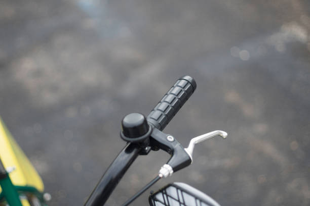 istock Handlebars of bicycle parked on street 912161792