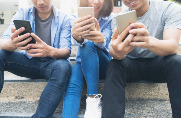 istock Group of young teen using mobile phones. 912162042