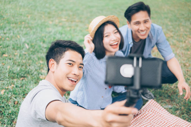 Young teen groups selfie by mobile phone.