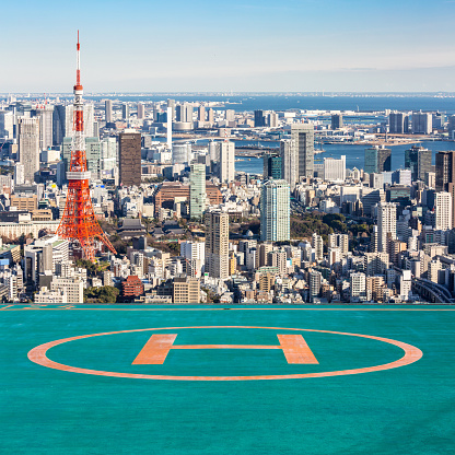 Tokyo Tower with skyline in Tokyo Japan with helipad