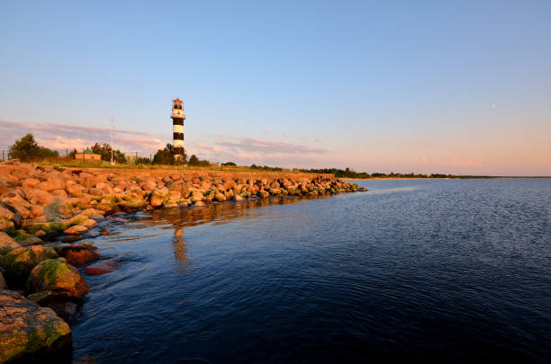 istock Sunny day near the lighthouse, Latvia. 912163880