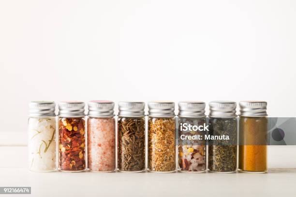 Spices Set In Mini Bottles Stock Photo - Download Image Now - Spice, Jar, Seasoning