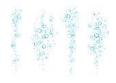 istock Blue underwater fizzing air bubbles  flow on white  background. 912166666