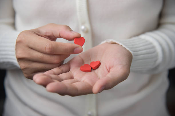 istock Female hands is holding pills. 912173538