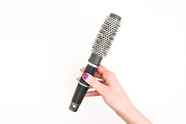 istock Holding Hairbrush For Curls 912174528