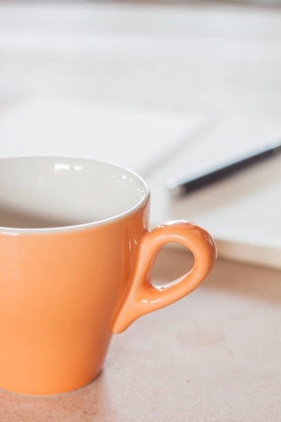 istock Close-Up Of Coffee Cup On Table 912182726