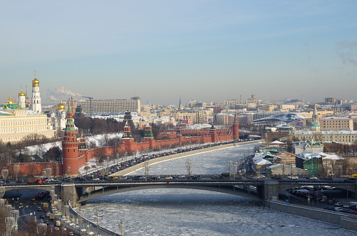 Winter view of the Moscow Kremlin, Big Stone bridge and the Moscow-river from the observation platform of Cathedral of Christ the Savior, Moscow, Russia