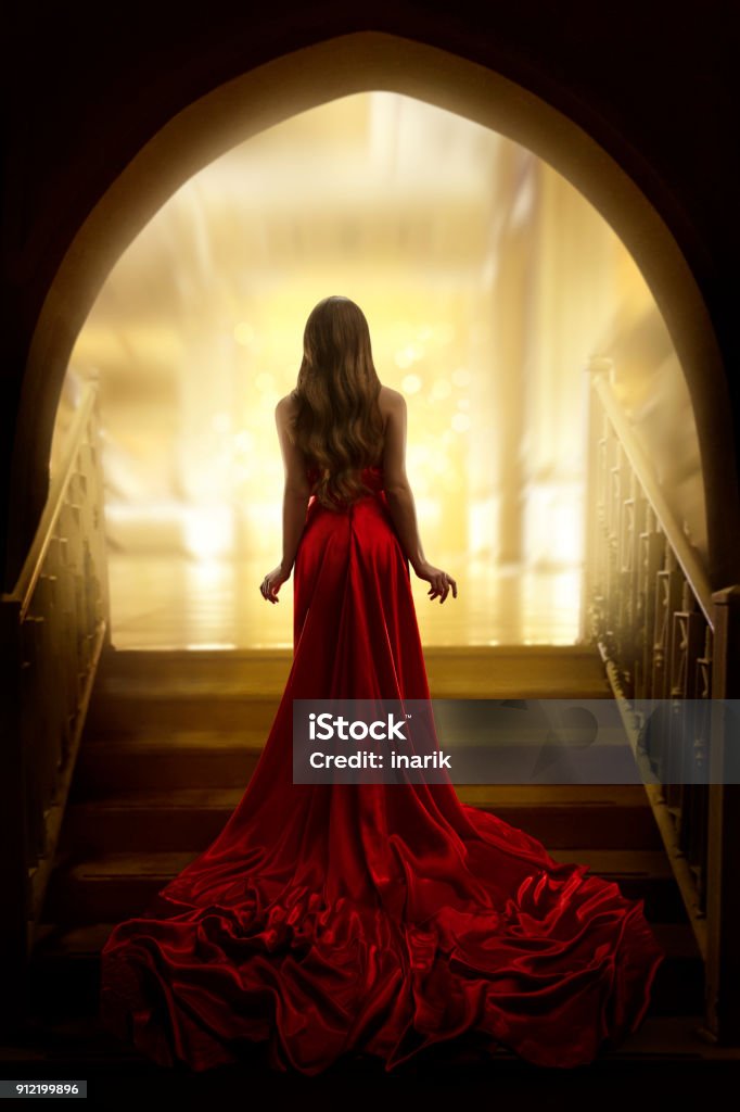 Elegant Woman Silhouette in Long Gown, Lady Rear View, Fashion Model Dress Waving on Stairs Elegant Woman Silhouette in Long Red Gown, Lady Back Rear View, Fashion Model Dress Fabric Waving on Stairs Women Stock Photo