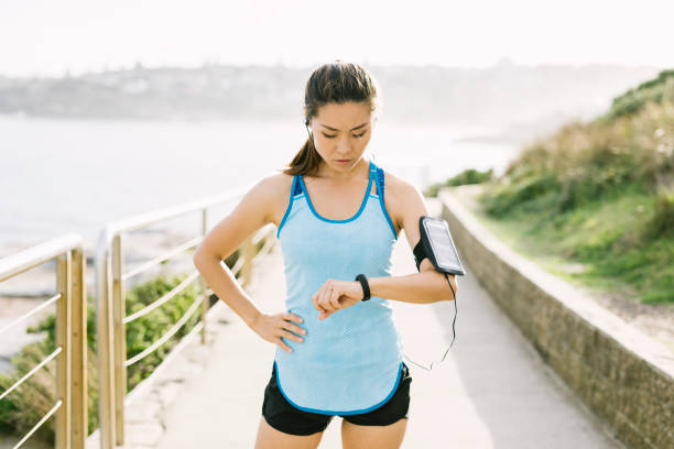 istock Fitness woman checking smart watch 912200490