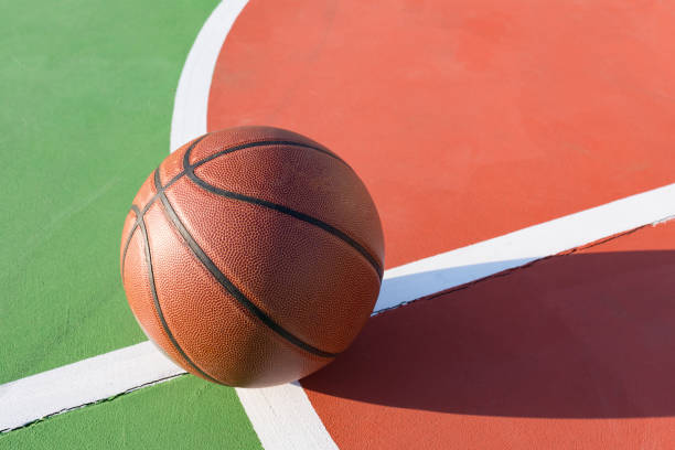 istock basketball on the playing field in a day time 912205012