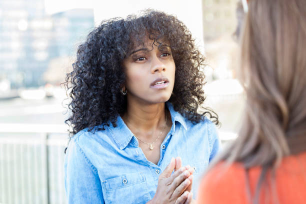 Concerned woman has serious conversation with her friend