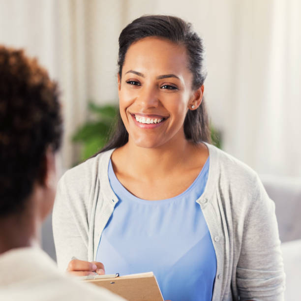istock Mental health professional discusses something with patient 912208968