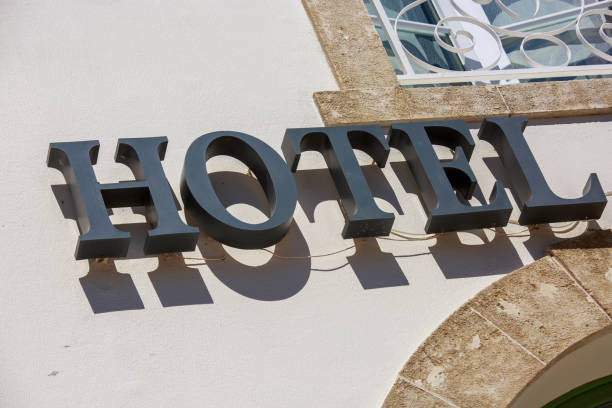 istock Hotel sign board on building 912212734