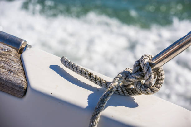 Marine blue rope tied to steel rod on boat