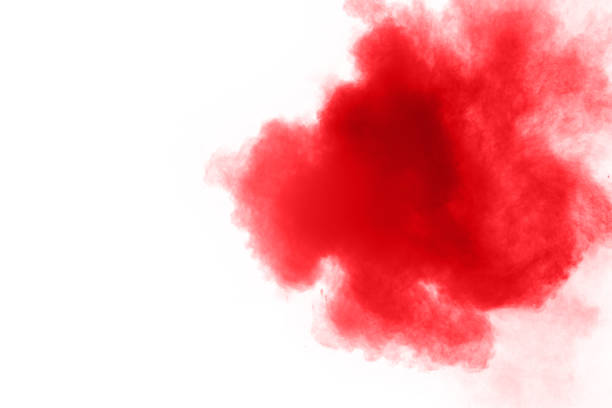 istock abstract red dust splattered on  white background. Red powder explosion on white background. Freeze motion of red particles splash. 912222782