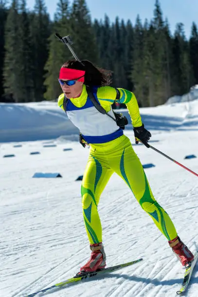 Front View of Young Female Biathlon Competitor Training