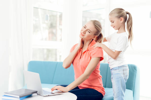 istock Mother is passionate about working on a laptop. Daughters do not have enough attention from mother. 912230364