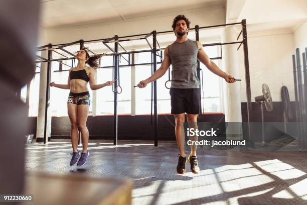 Athletes Training Hard At The Gym Stock Photo - Download Image Now - Jumping Rope, Jump Rope, Exercising