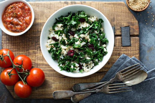 istock Warm kale salad with brown rice and cranberry 912230840