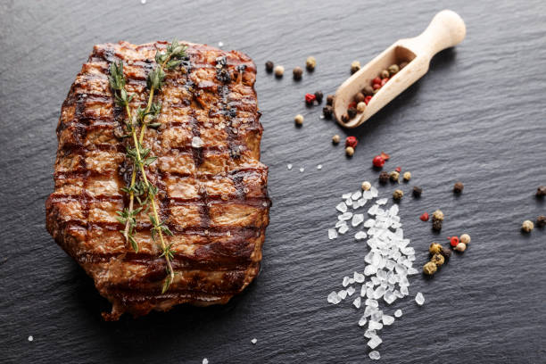 istock Cooked steak marble grilled meat with spices. 912234600