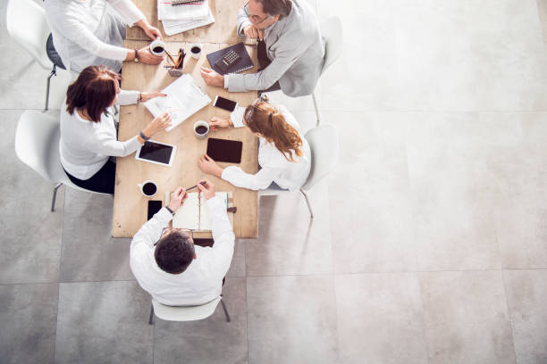 istock Top view in office while people having a meeting 912235500