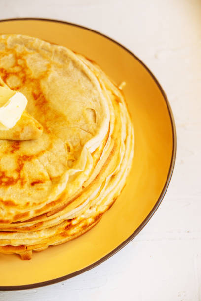 istock Russian traditional food. Appetizing fried pancakes during Pancake Week 912236124